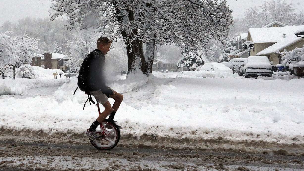 Snow pounds the Wasatch Front as commuters ready for drive home