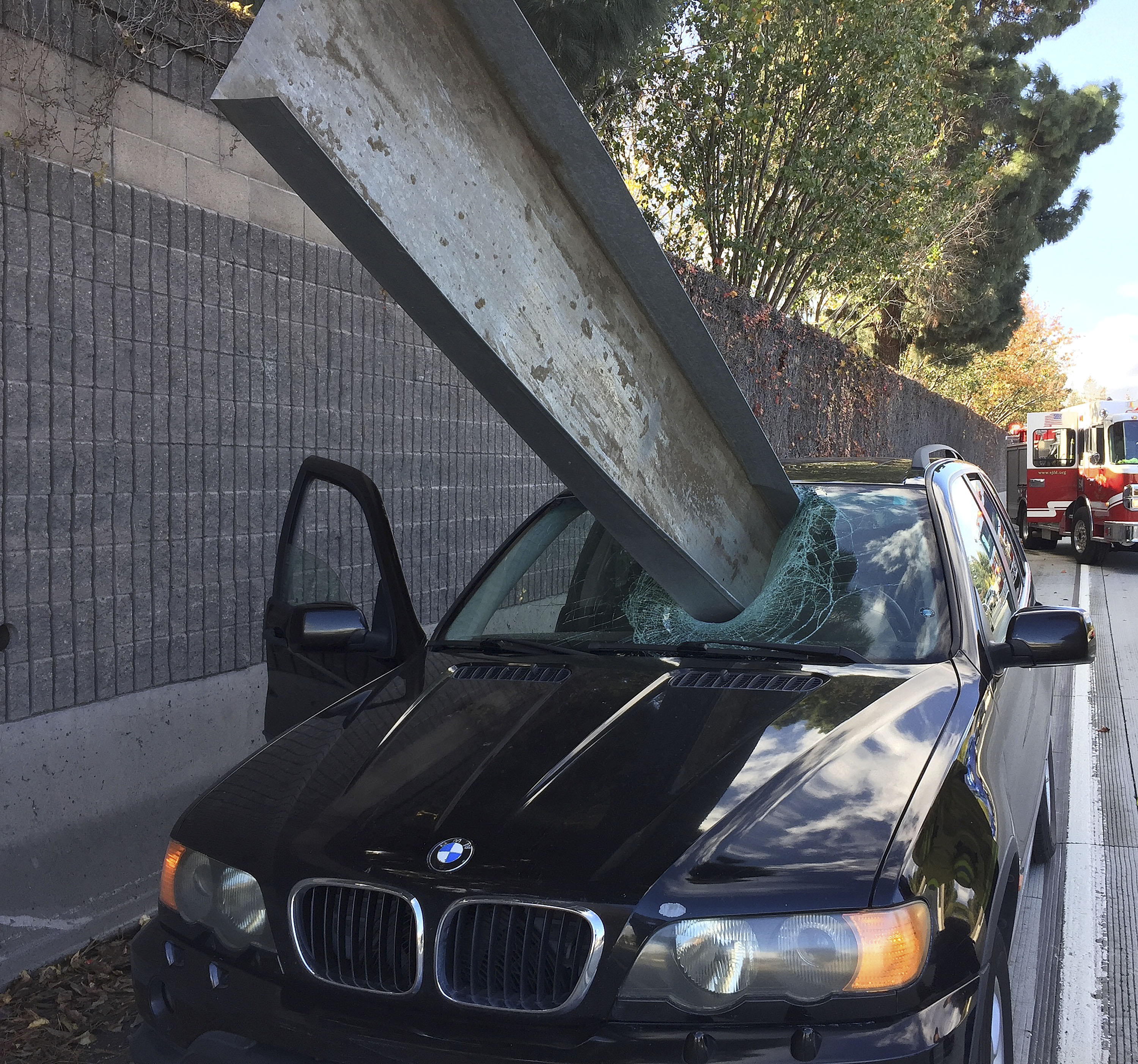 Driver dodges death when large metal beam pierces windshield