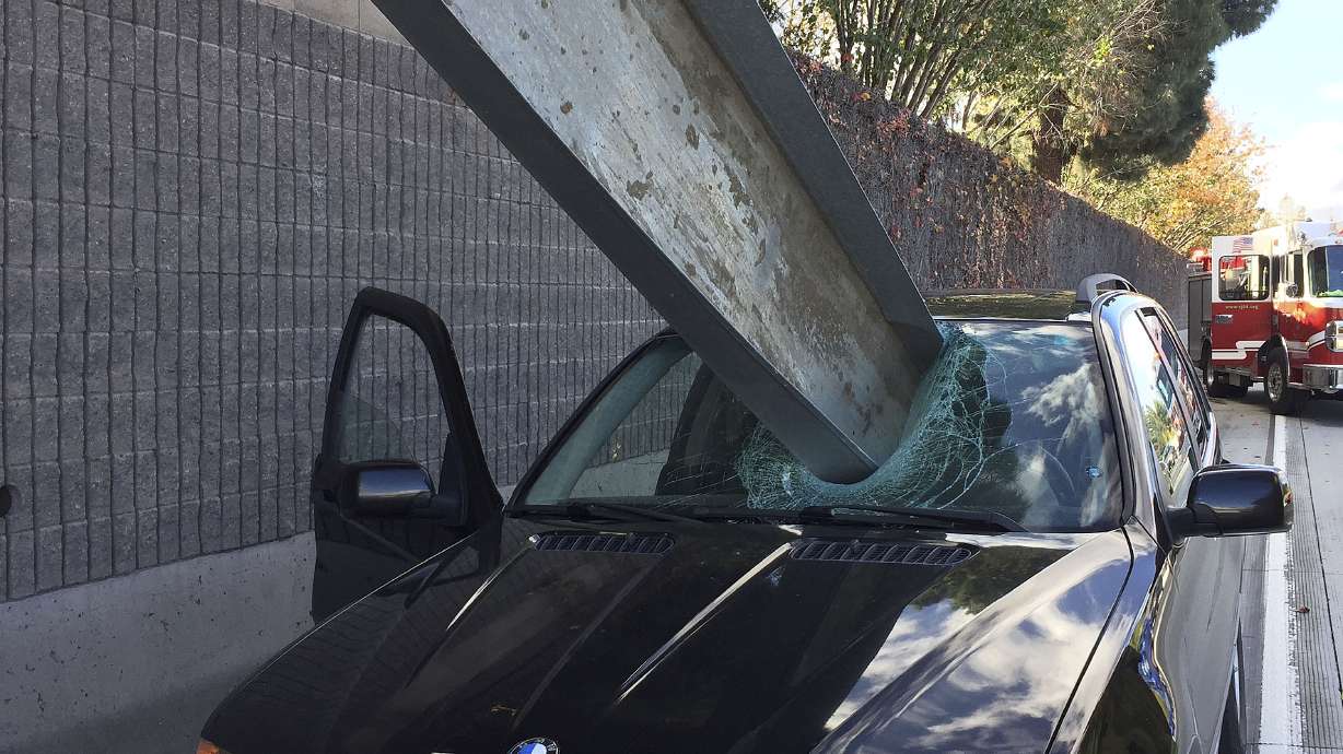 Driver dodges death when large metal beam pierces windshield