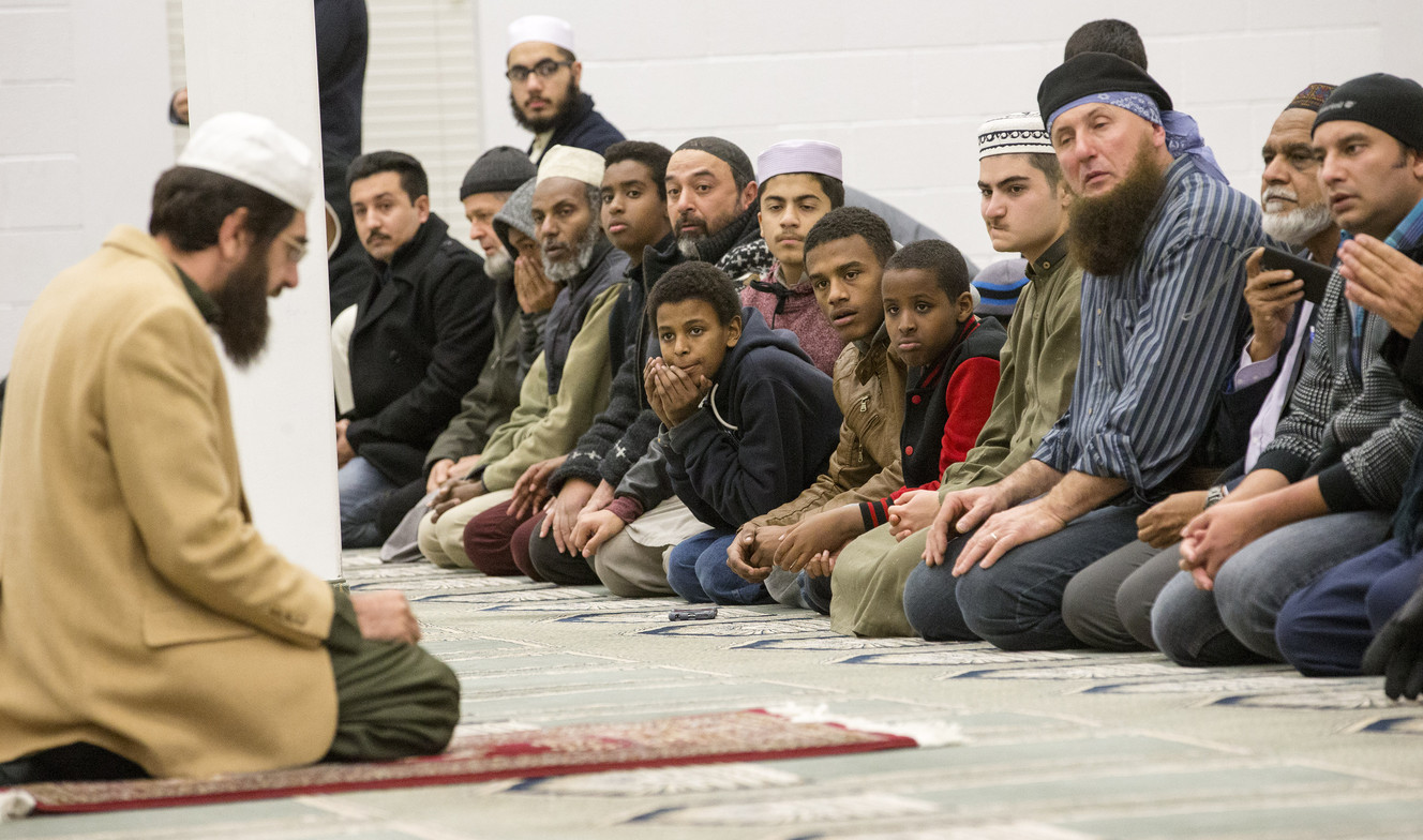 Imaam Muhammed S Mehtar leads the prayers prior to Congressman Jason Chaffetz speaking with Islamic community members at the Khadija Mosque in West Valley City Monday, Dec. 14, 2015. (Photo: Scott G Winterton, Deseret News)