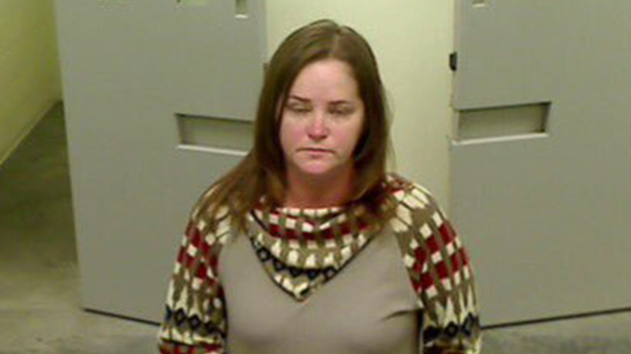 Zions Bank teller Stephanie Huber Bennett, 44 (Photo courtesy Tooele County Jail)