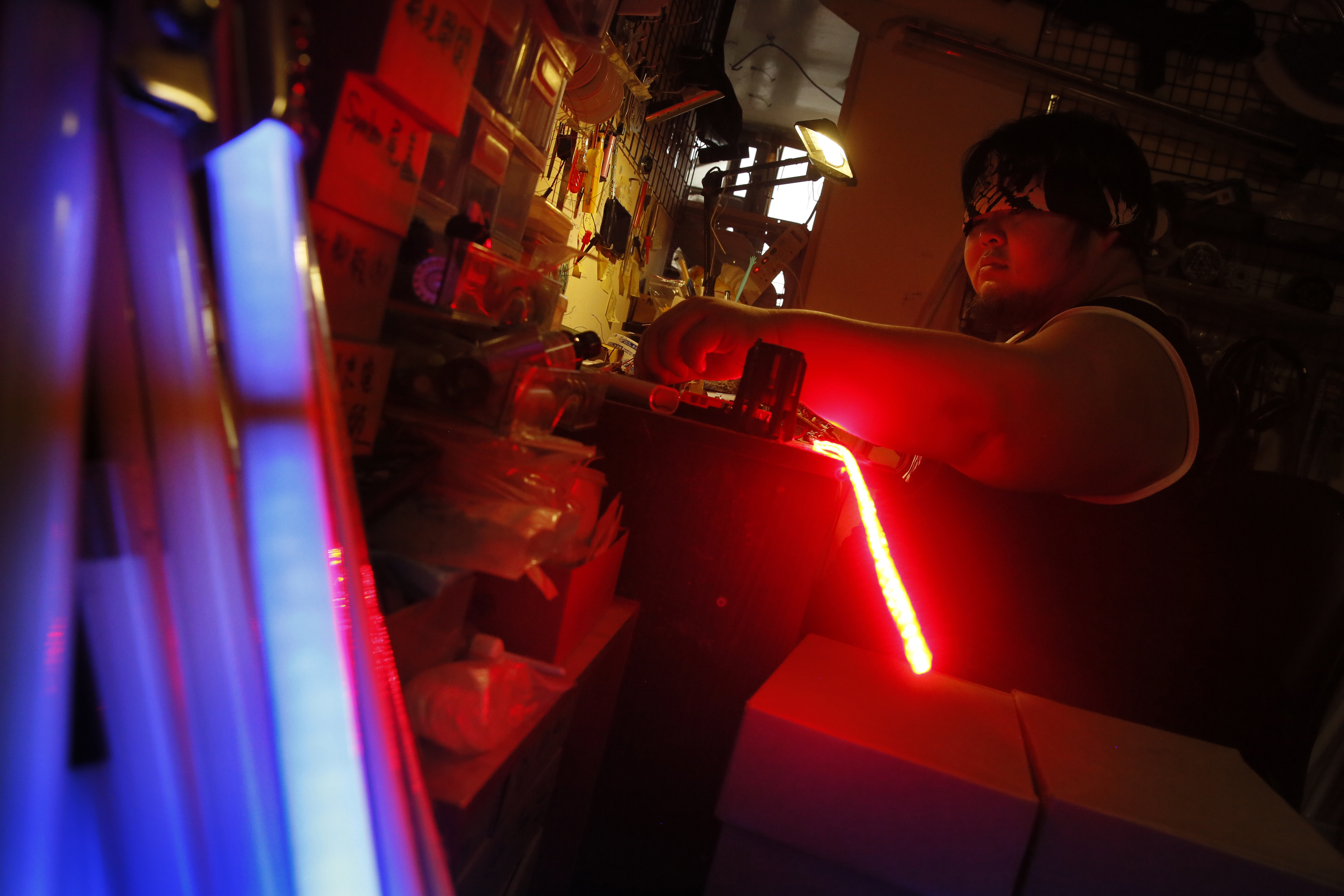 "Star Wars" fan's dream job: Crafting realistic lightsabers
