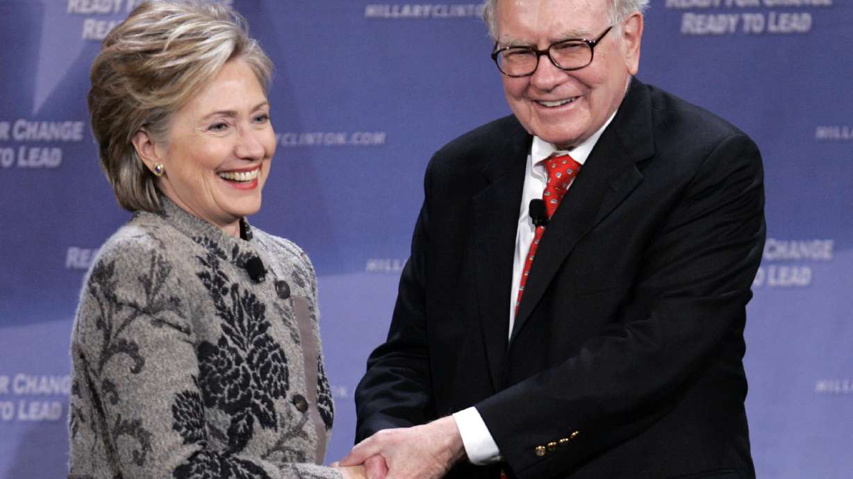Clinton says she wants to go beyond 'Buffett rule' on taxes