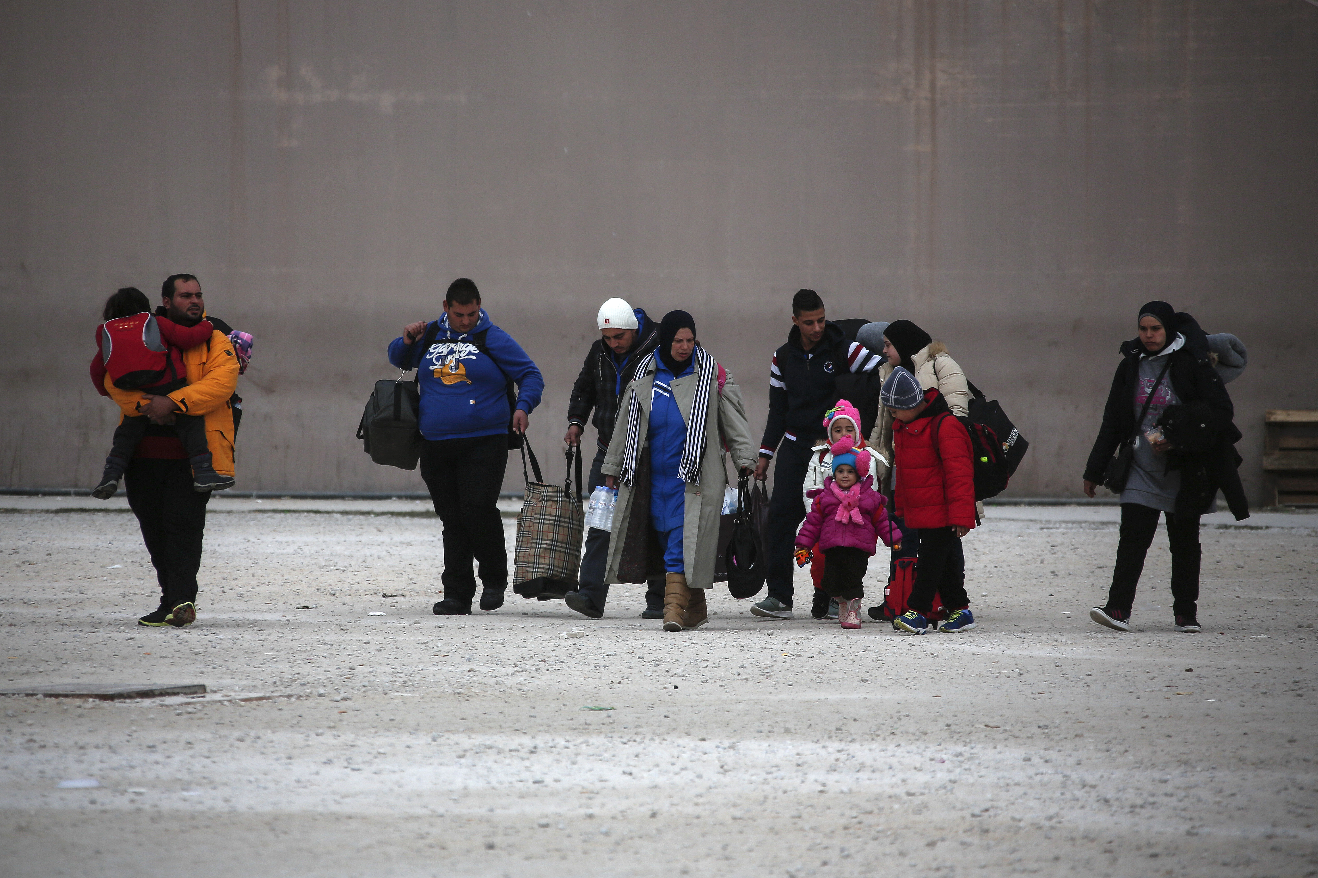 The Latest: Riots at Dutch meeting on building asylum center
