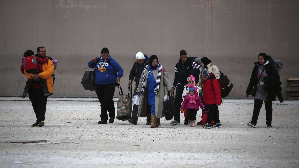 The Latest: Riots at Dutch meeting on building asylum center