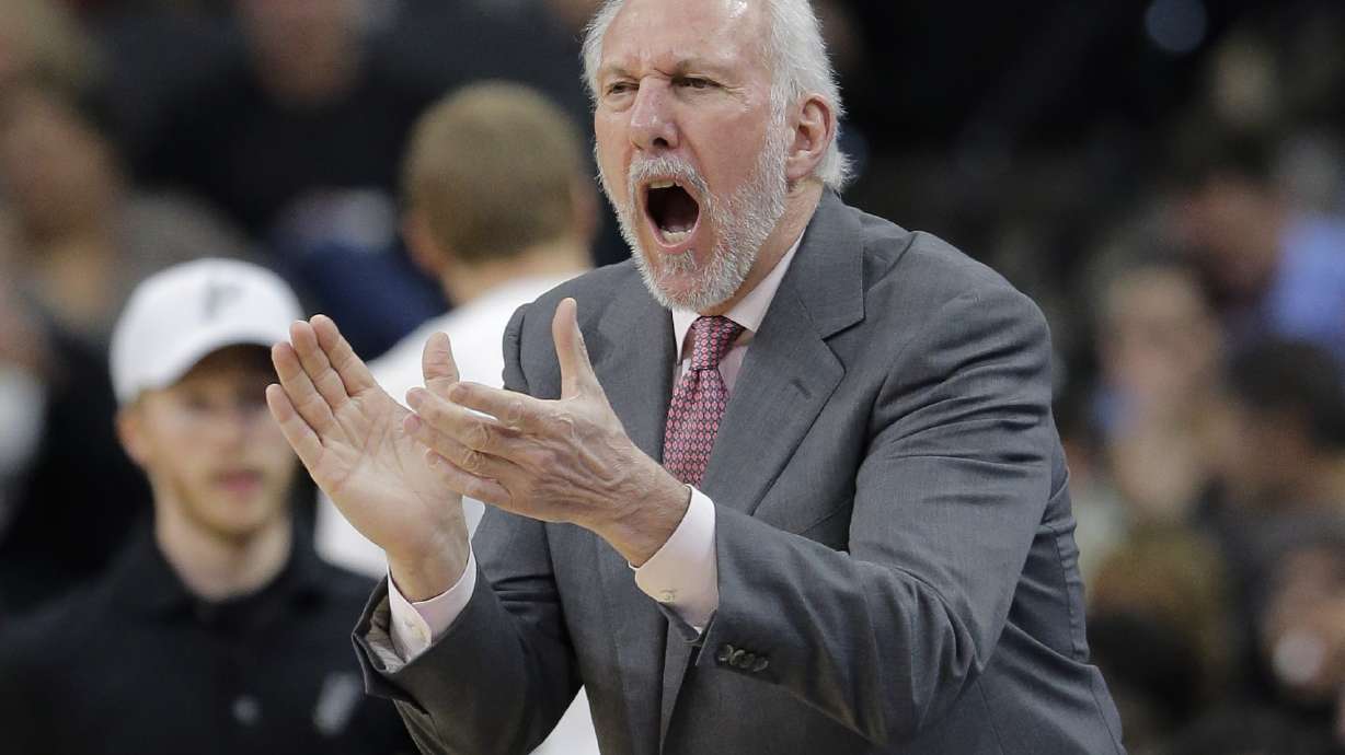 Spurs beat Wizards for team-record 23rd straight home win