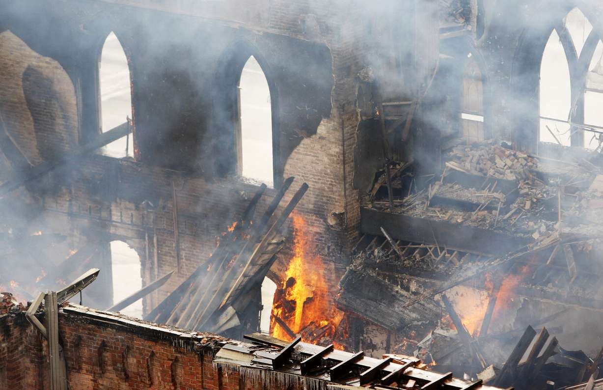 Flames continued burning inside the old Provo Tabernacle. Provo City firefighters respond to a large fire at the historic Provo Tabernacle Friday, Dec. 17, 2010. (Photo: Scott G Winterton, Deseret News, File photo)