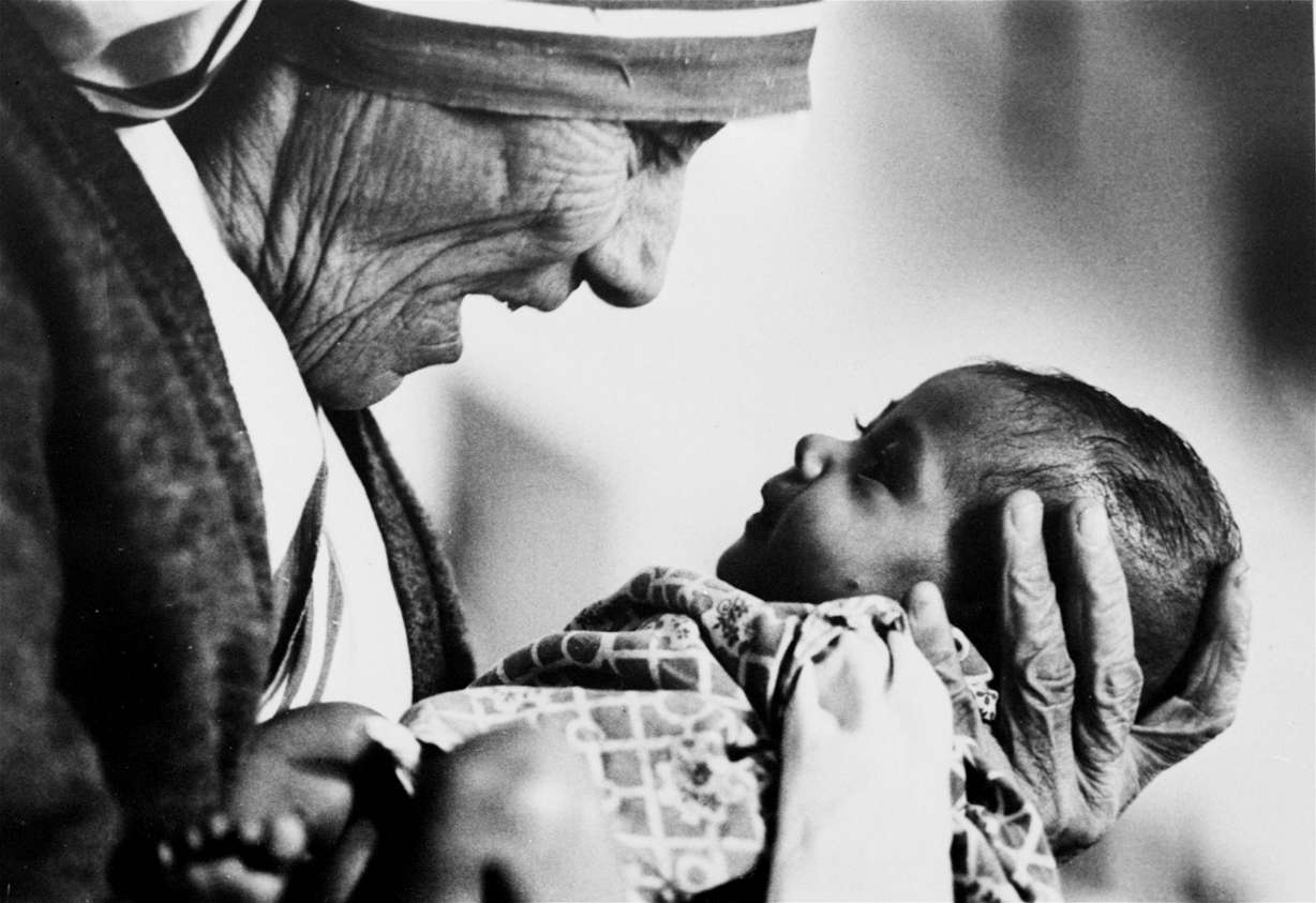 FILE - In this 1978, file photo, Mother Teresa, head of the Missionaries of Charity order, cradles an armless baby girl at her order's orphanage in what was then known as Calcutta, India, in 1978. Photo: AP Photo