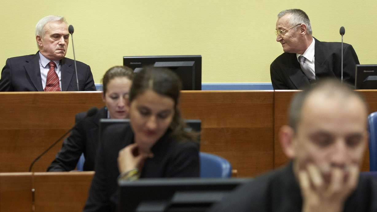 Former Milosevic allies arraigned in war crimes retrial