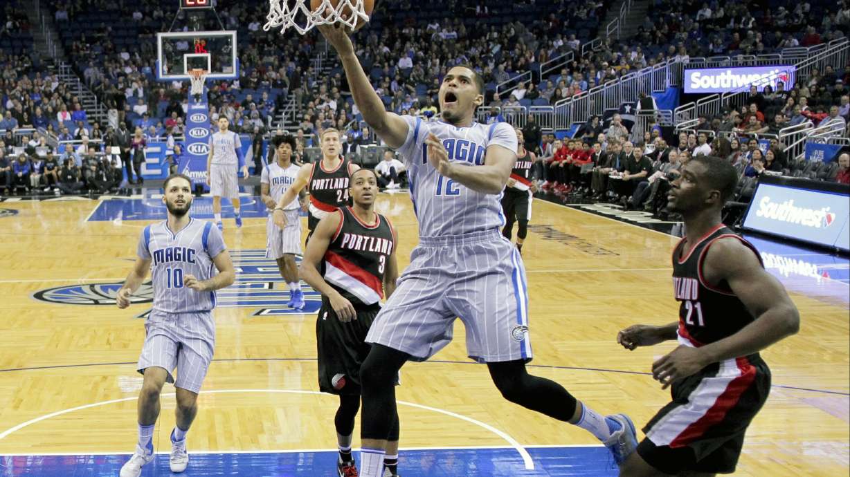 Magic withstand late rally to beat Blazers 102-94
