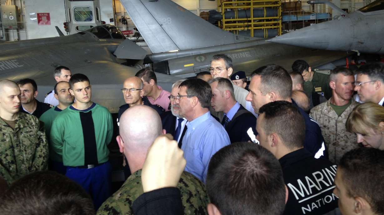 US defense chief visits French, US warships in Persian Gulf