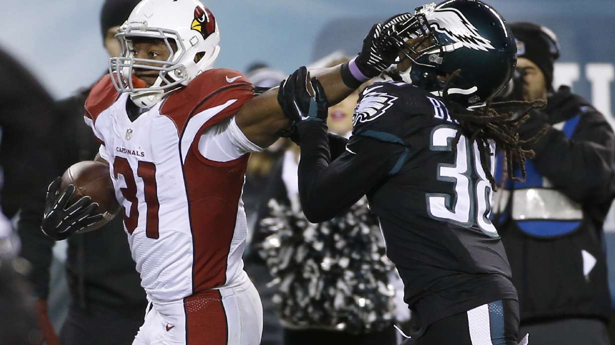 Johnson runs for 3 TDs, Cardinals beat Eagles 40-17