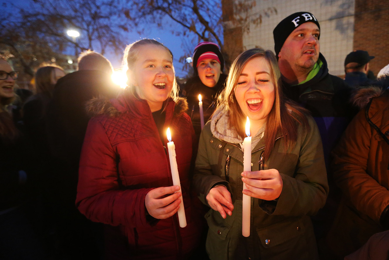 Emma May and Whitney May sing Christmas carols as Soul Food USA holds its fifth annual Christmas Chili Night for the Homeless at the Road Home in Salt Lake City on Sunday, Dec. 20, 2015. (Photo: Jeffrey D. Allred, Deseret News)