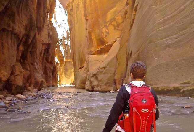 Hiking the Zion Narrows from top to bottom requires a permit. Permit reservations available at www.nps.com/zion. (Photo: Mike Godfrey, At Home in Wild Spaces)