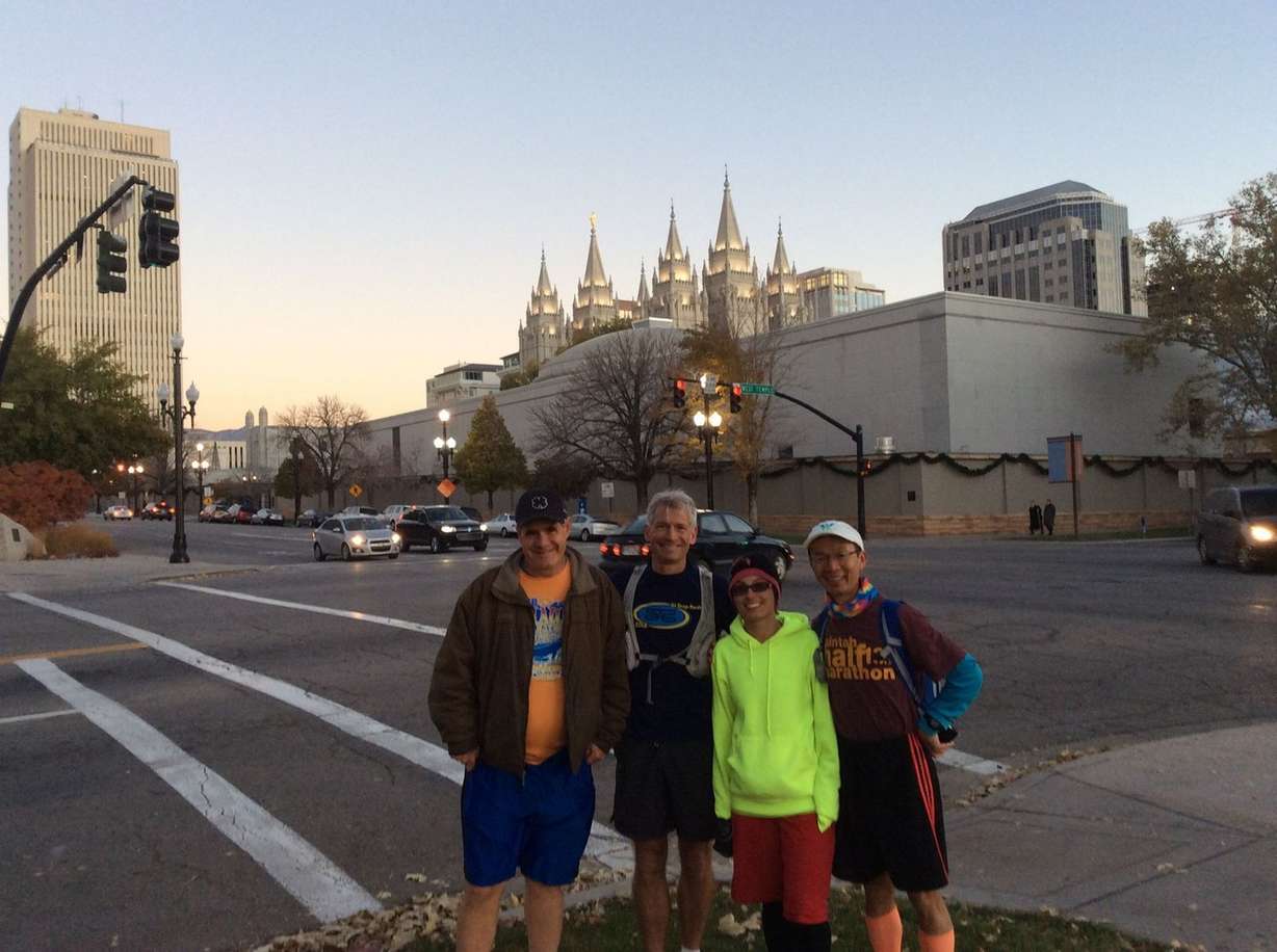 Wan Ho Kou is pictured with fellow runners upon reaching the Salt Lake City Temple. (Photo: Arianne Brown)