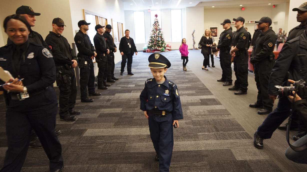 Boy, 7, sworn in as Detroit police chief for a day