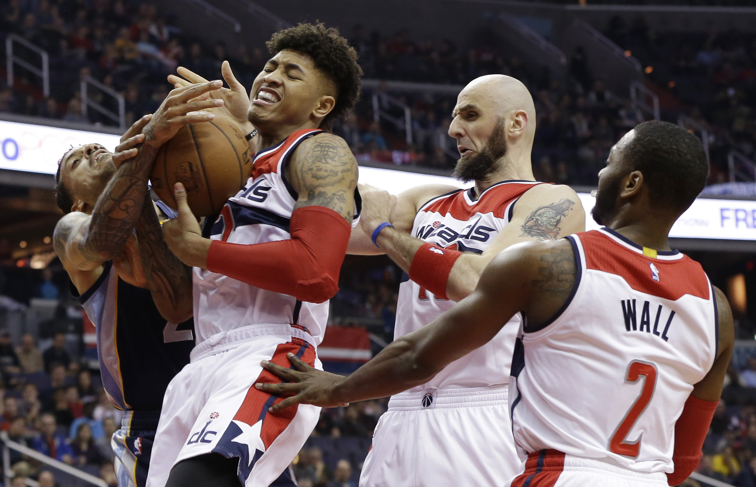 Wall helps Wizards beat Grizzlies 100-91