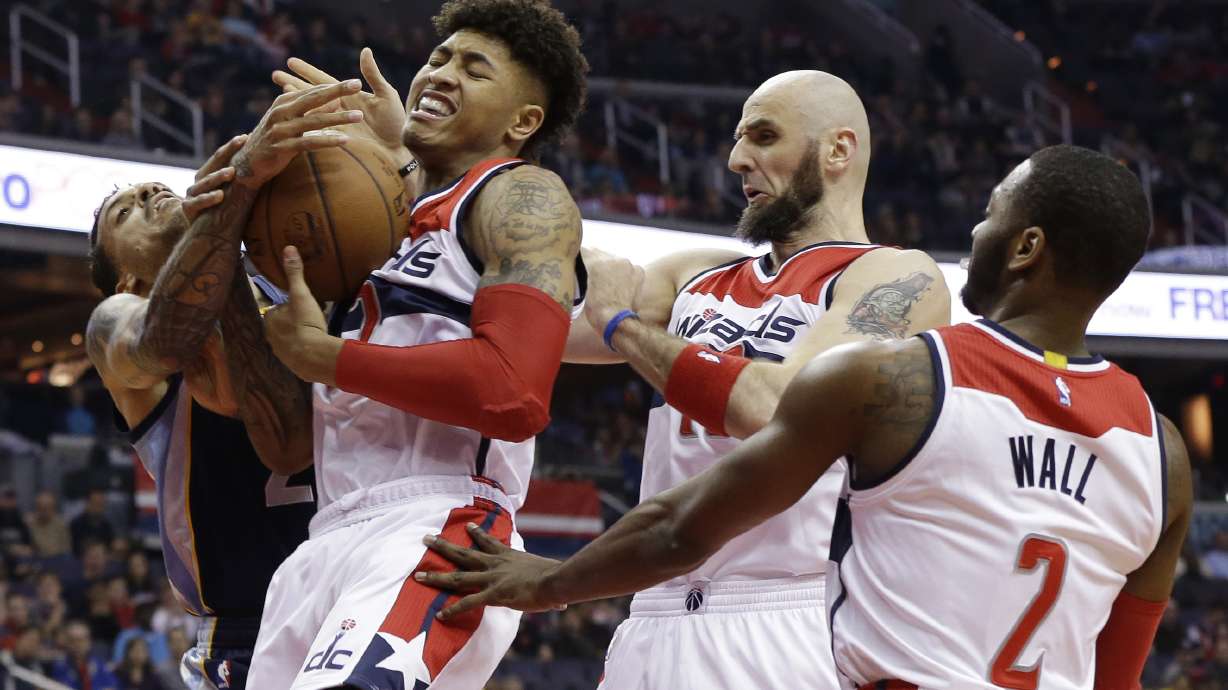 Wall helps Wizards beat Grizzlies 100-91