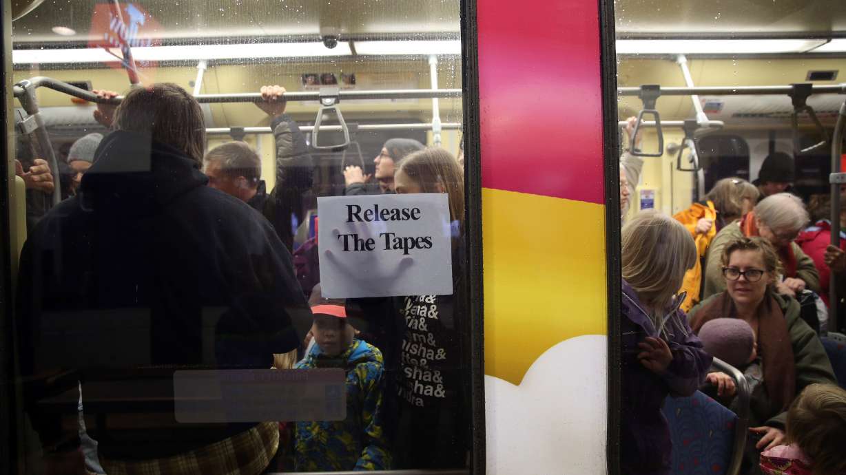 The Latest: Details emerge about airport protest arrests