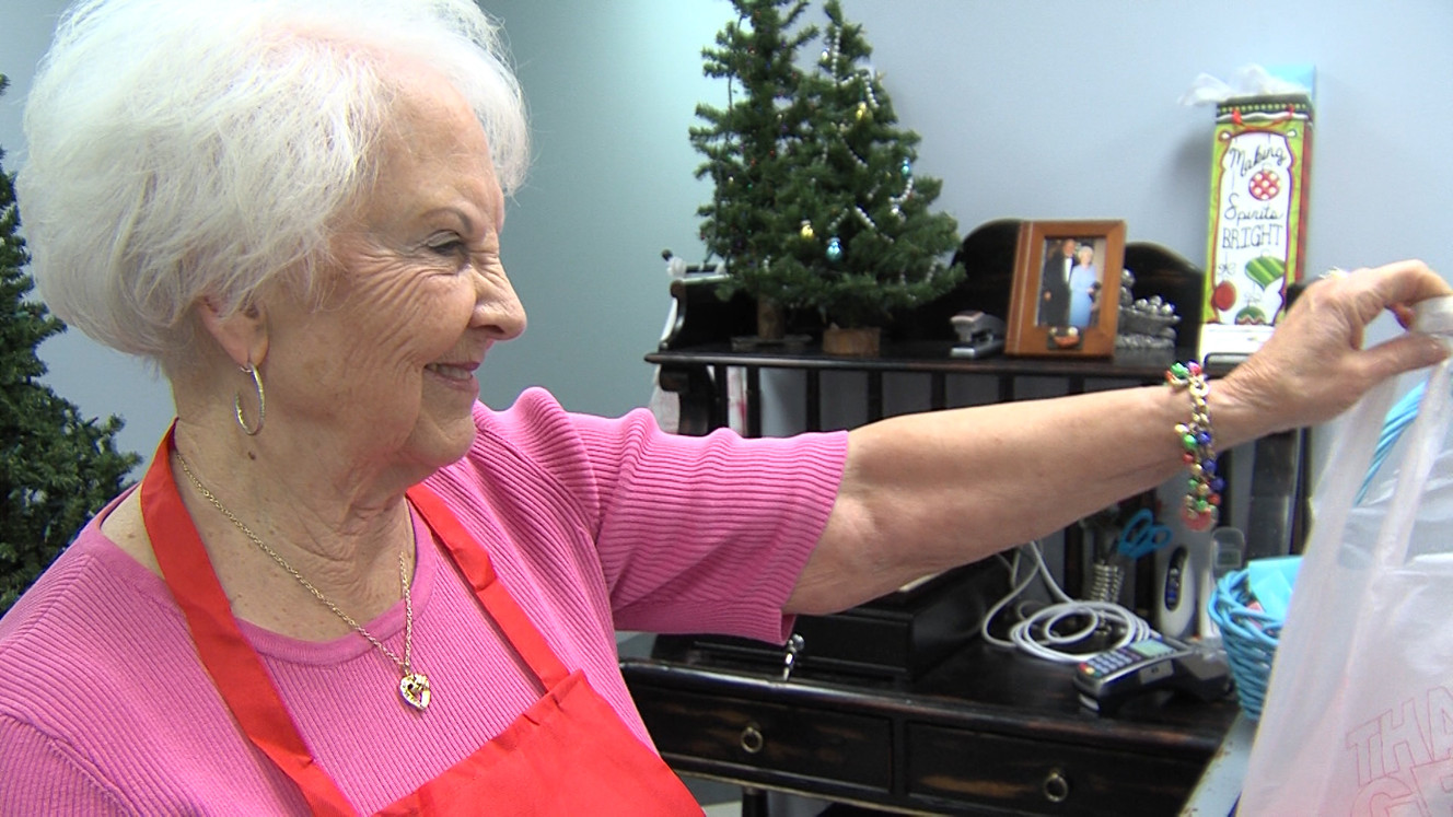 Richard Wood's wife Loraine, selling candy. (Photo: Ray Boone, KSL-TV)