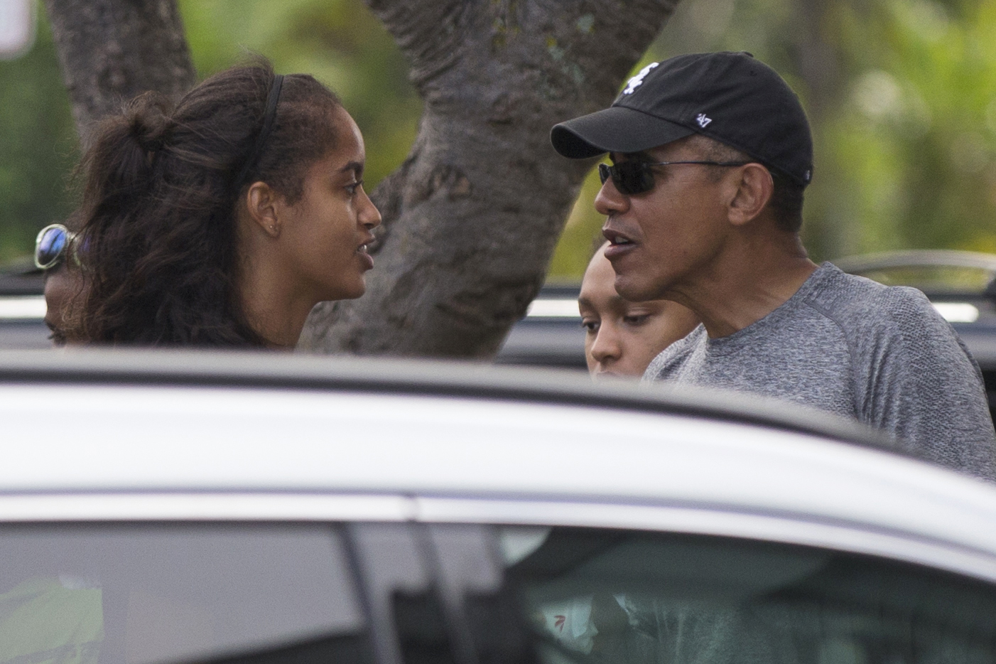 The Latest: Obamas having dinner at Honolulu restaurant