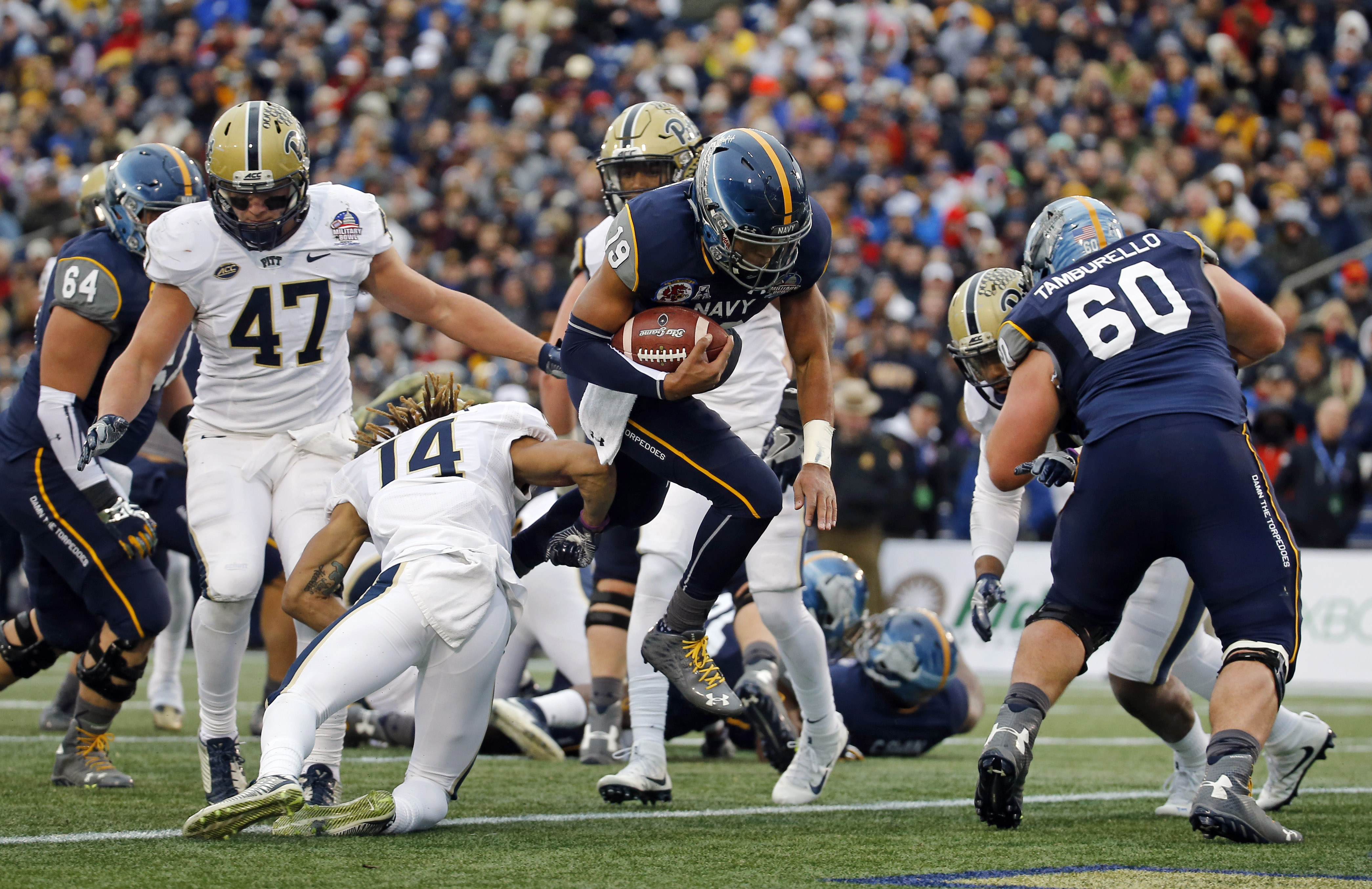 Reynolds leads Navy over Pitt 44-28 in Military Bowl