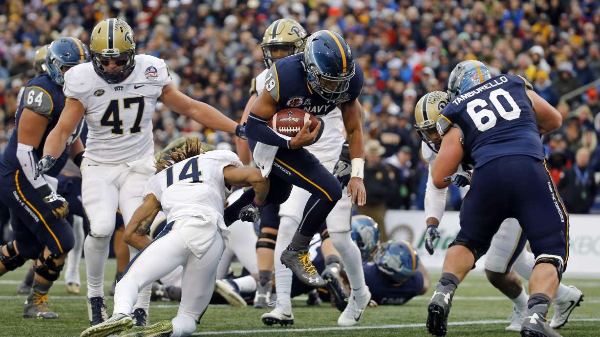 Reynolds leads Navy over Pitt 44-28 in Military Bowl
