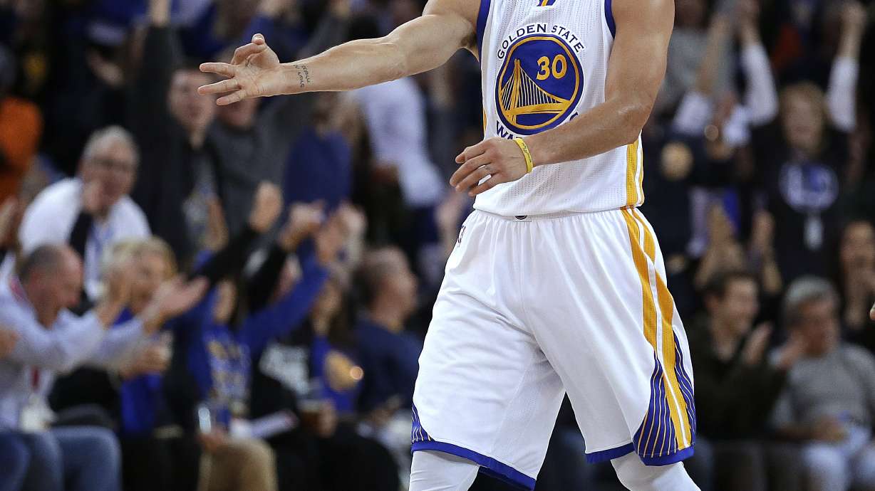 Curry's triple-double leads Warriors past Kings 122-103