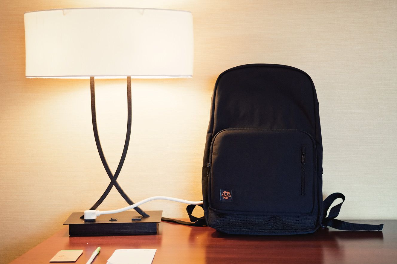 Cable-organizing backpack charges multiple devices with just 1 cable