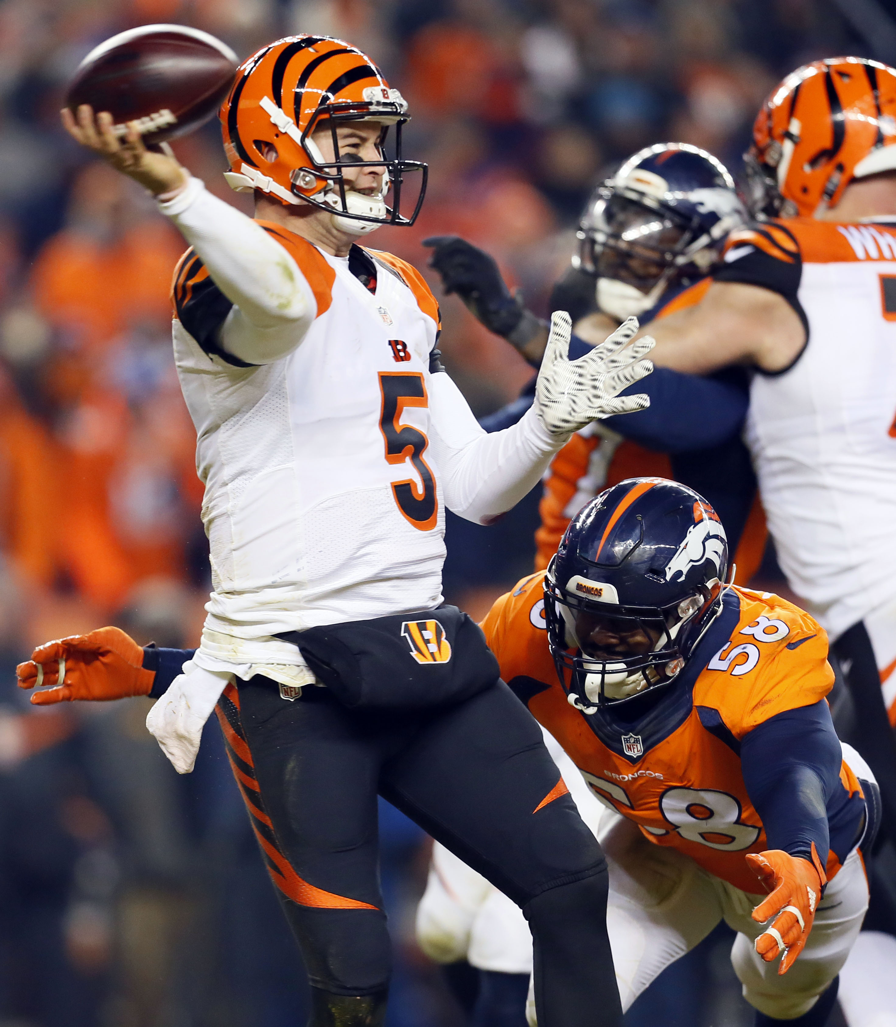 AJ McCarron practices with sore left wrist, ready for Ravens