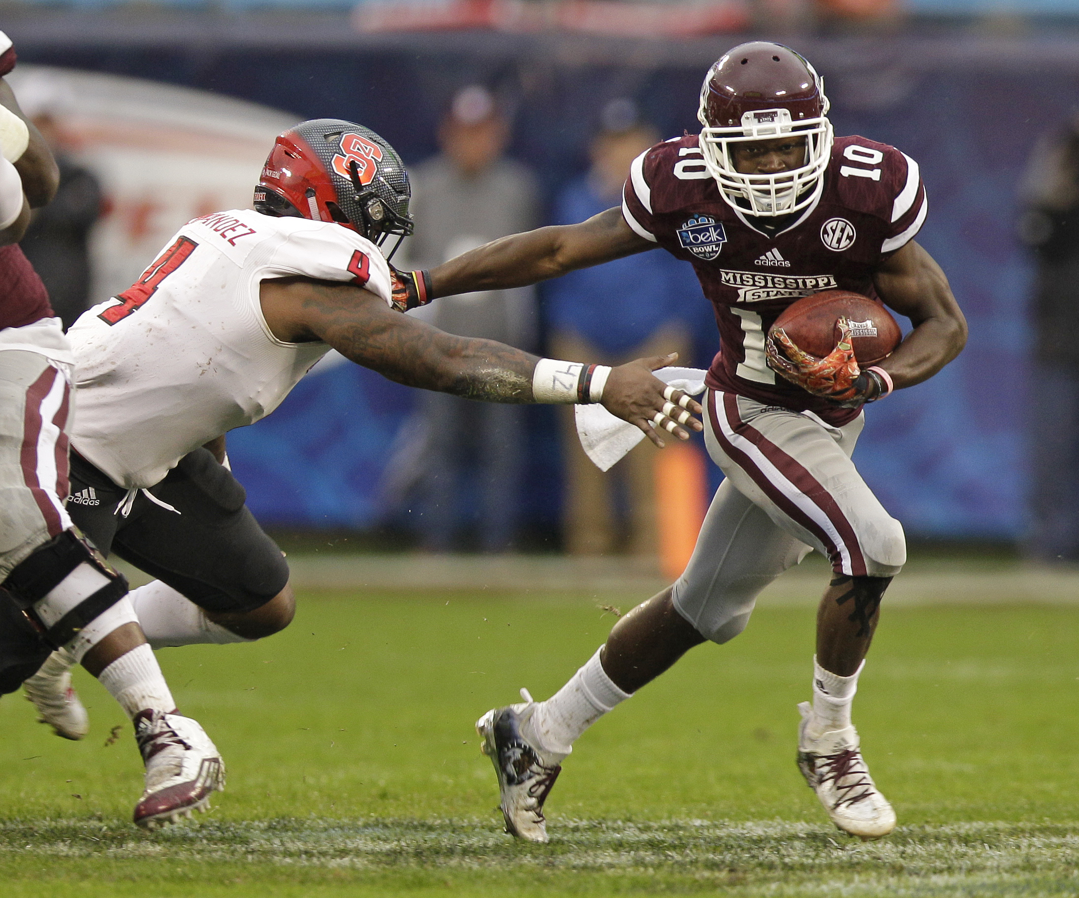Prescott, Mississippi State top NC State 51-28 in Belk Bowl