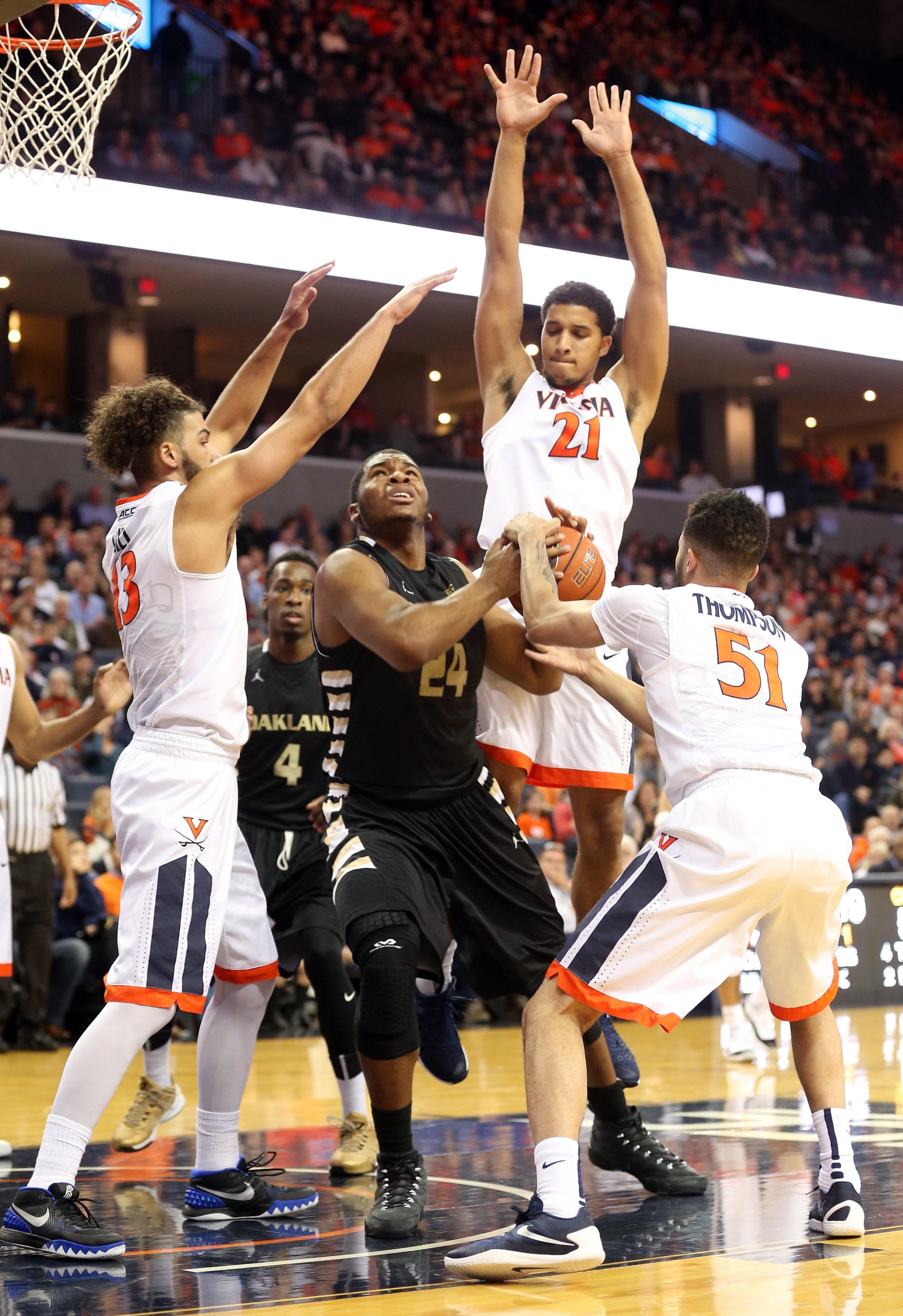 Gill leads No. 5 Virginia to 71-58 victory over Oakland