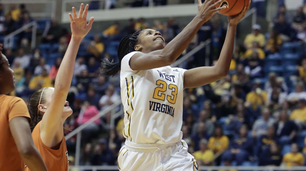 Atkins leads No. 5 Texas to 65-54 win over West Virginia