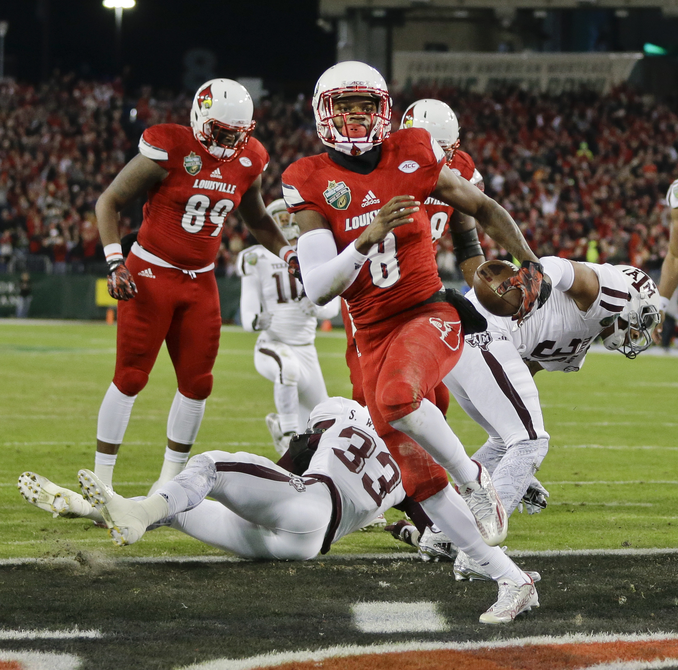 Lamar Jackson has 4 TDs, Louisville beats Texas A&M 27-21