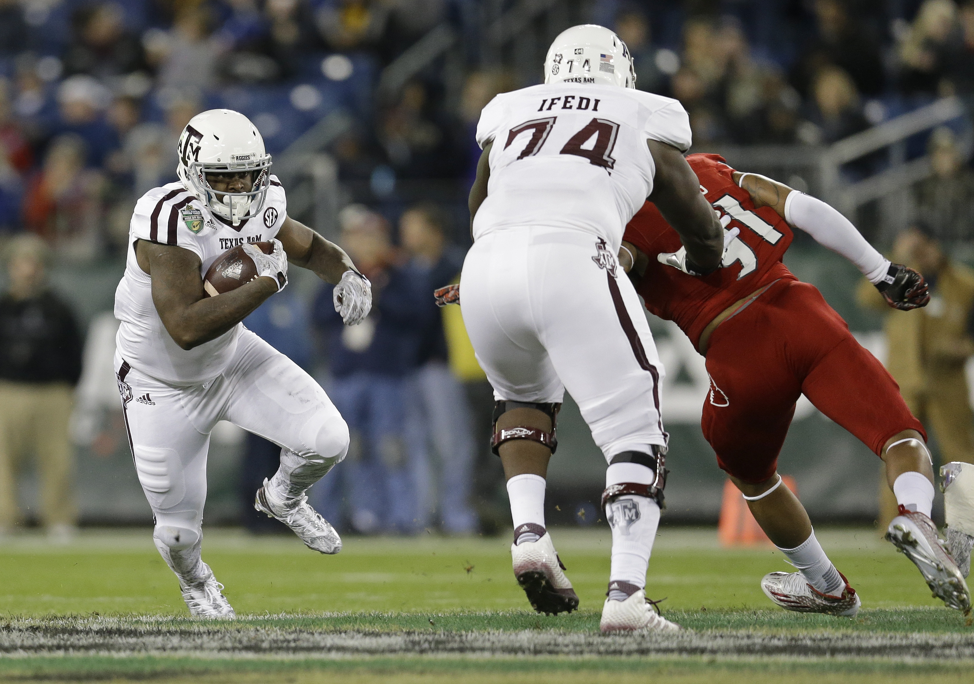 Louisville LB Trevon Young in hospital with injured left hip