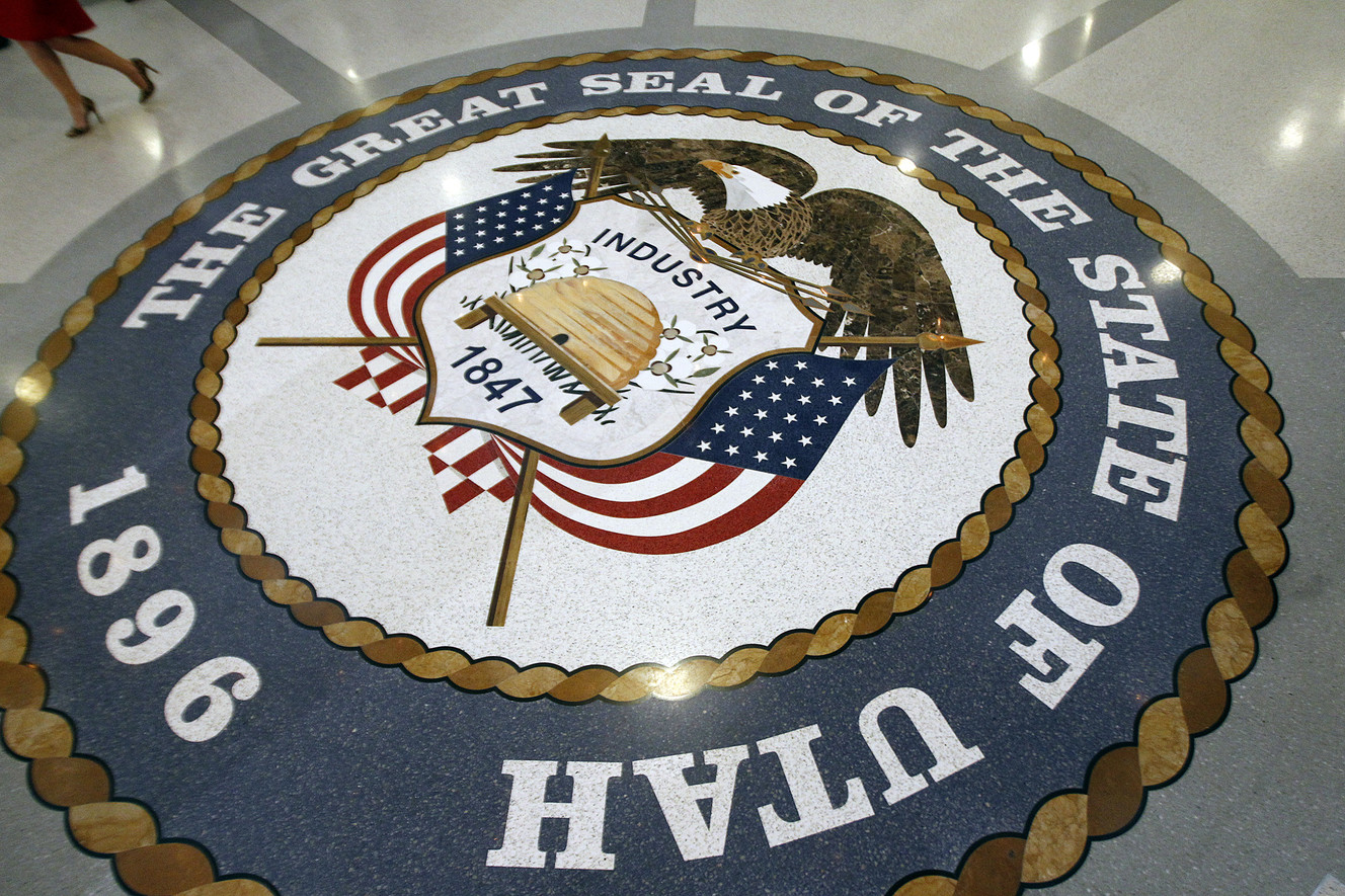 A new state seal is unveiled during a ceremony commemorating the 100th anniversary of the Utah Capitol building in Salt Lake City on Monday, Jan. 4, 2016. The seal is located on the first floor of the building. (Photo: Chris Samuels, Deseret News)