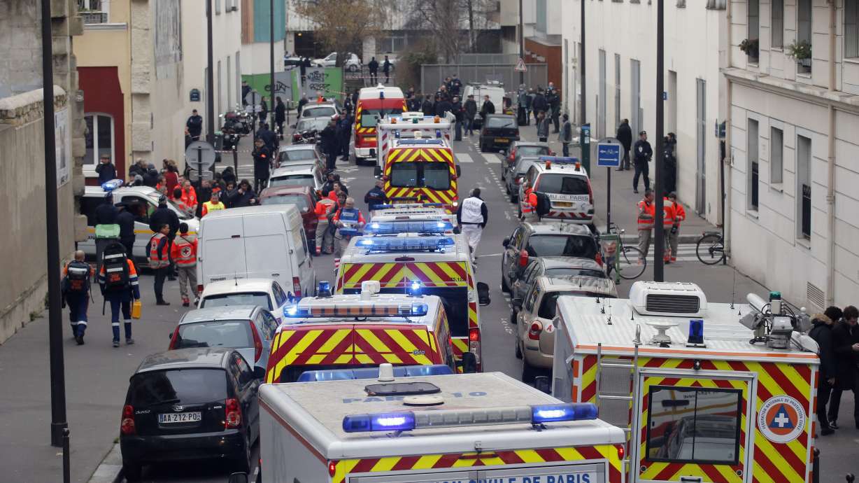 French president honors Charlie Hebdo, kosher market victims