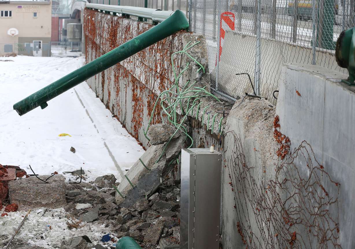 Damage to a concrete wall can be seen Tuesday, Jan. 5, 2016, after a TRAX train crashed into it in Salt Lake City on Monday, Jan. 4, 2016. (Photo: Scott G Winterton, Deseret News)