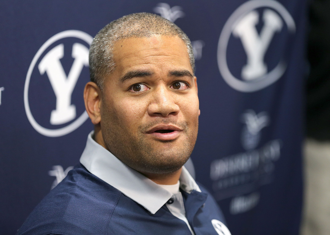 BYU defensive coordinator Ilaisa Tuiaki talks with the press, Jan. 5, 2016, in Provo. (Photo: Tom Smart, Deseret News)
