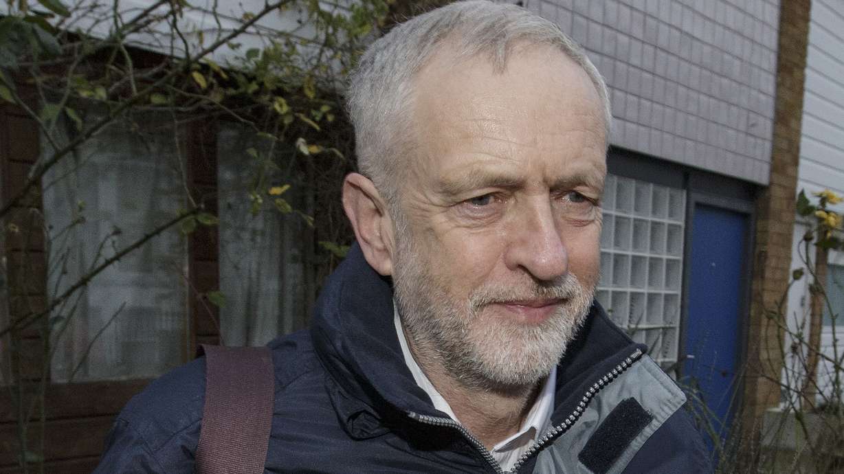 Leader of Britain's divided Labour Party fires party rebels