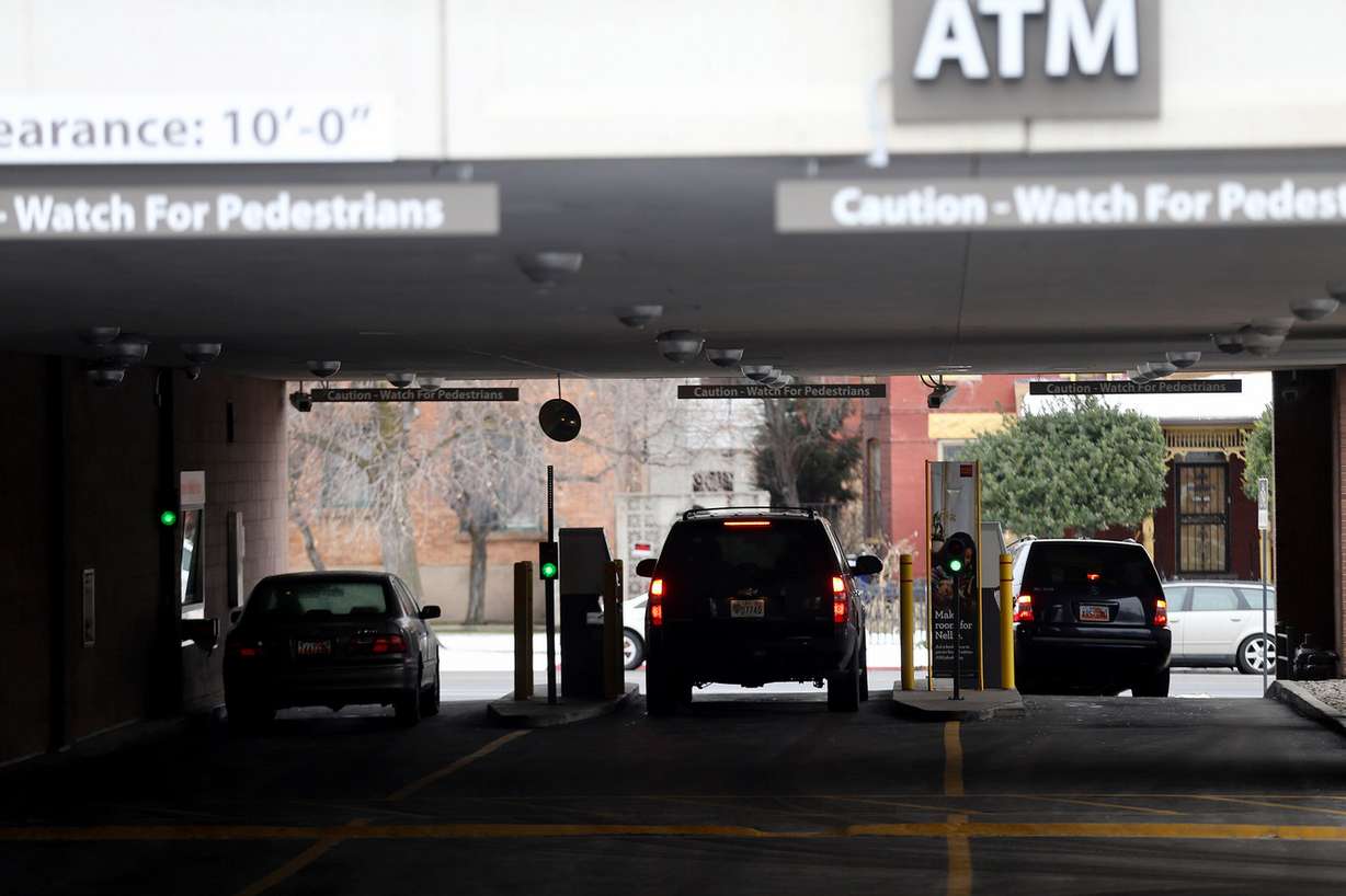Emissions of volatile organic compounds are released from vehicles' tailpipes as they idle at a bank's drive-thru in Salt Lake City on Wednesday, Jan. 6, 2016. In partnership with the Utah Department of Environmental Quality, Weber State University researchers teamed up with Utah State University to study cold starts, idling and their connection to emissions from 70 models of cars that are typical of what is driven along the Wasatch Front. (Photo: Laura Seitz, Deseret News)