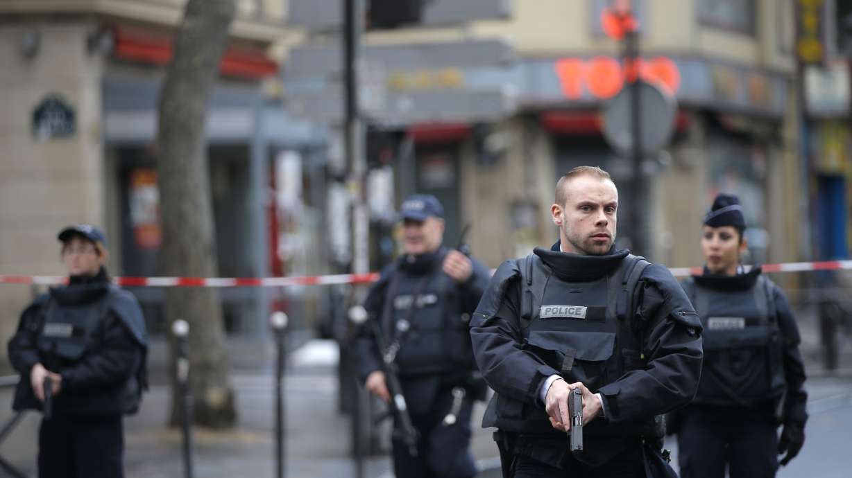 The Latest: Initial probes identify man in Paris shooting