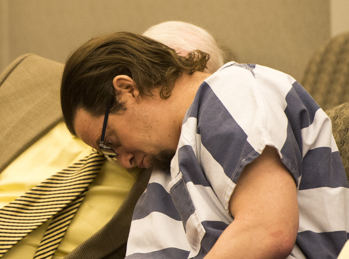 Joshua Schoenenberger listens to defense attorney Ed Brass during his preliminary hearing in Farmington on Thursday, Jan. 7, 2016. Schoenenberger is accused of fatally beating his girlfriend's 2-year-old son to death. (Photo: Rick Egan)