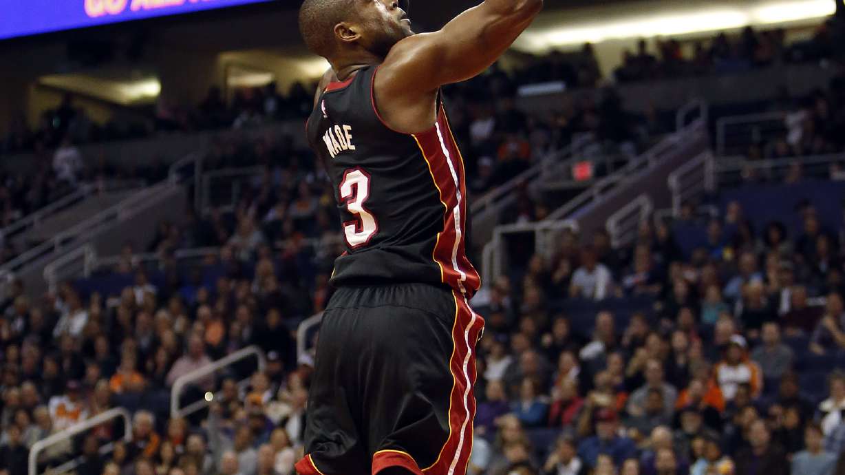 Wade scores 27, Heat win as Dragic, Green return to Phoenix