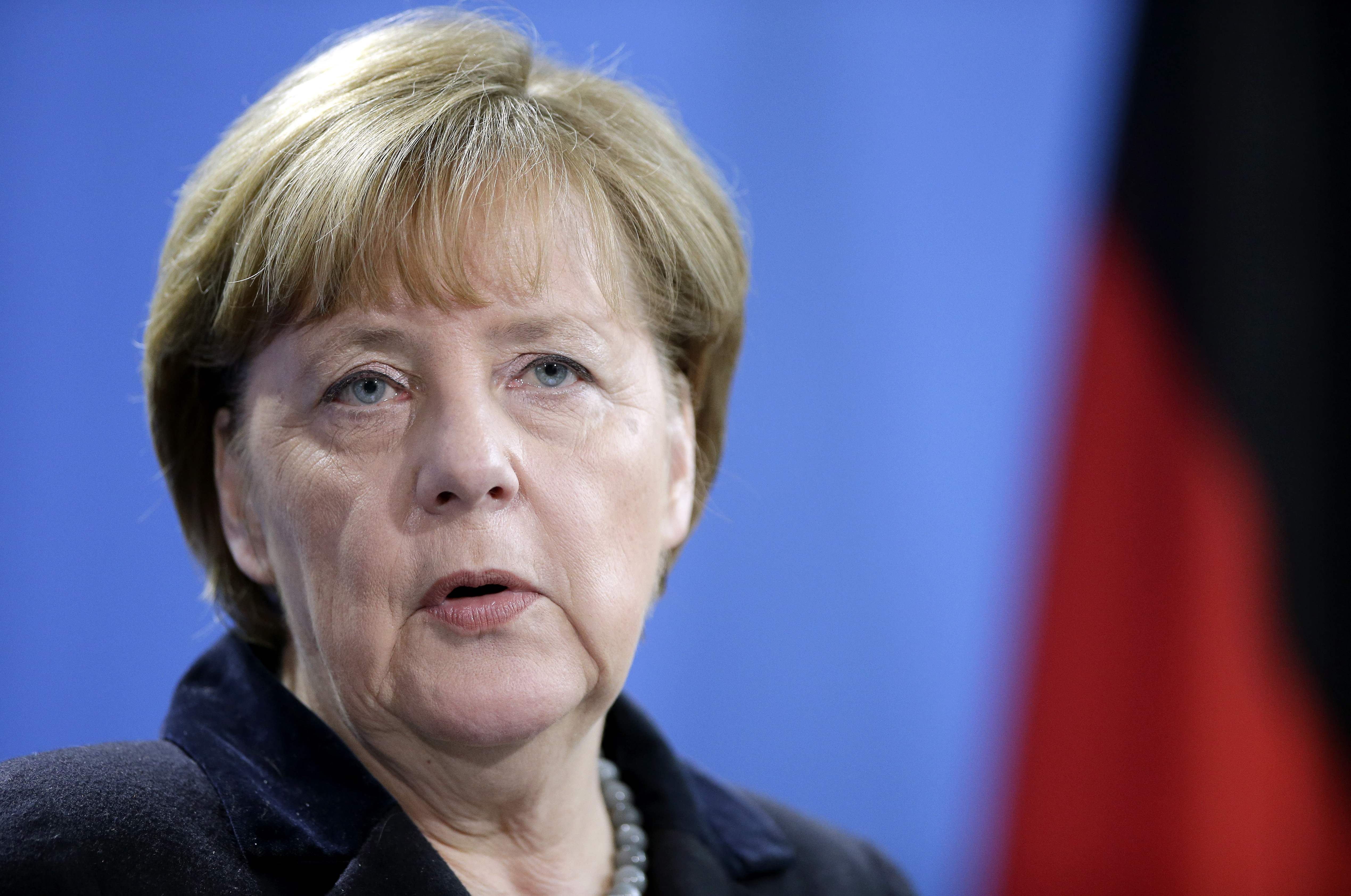 Protests in Cologne after assaults; Merkel pledges new laws