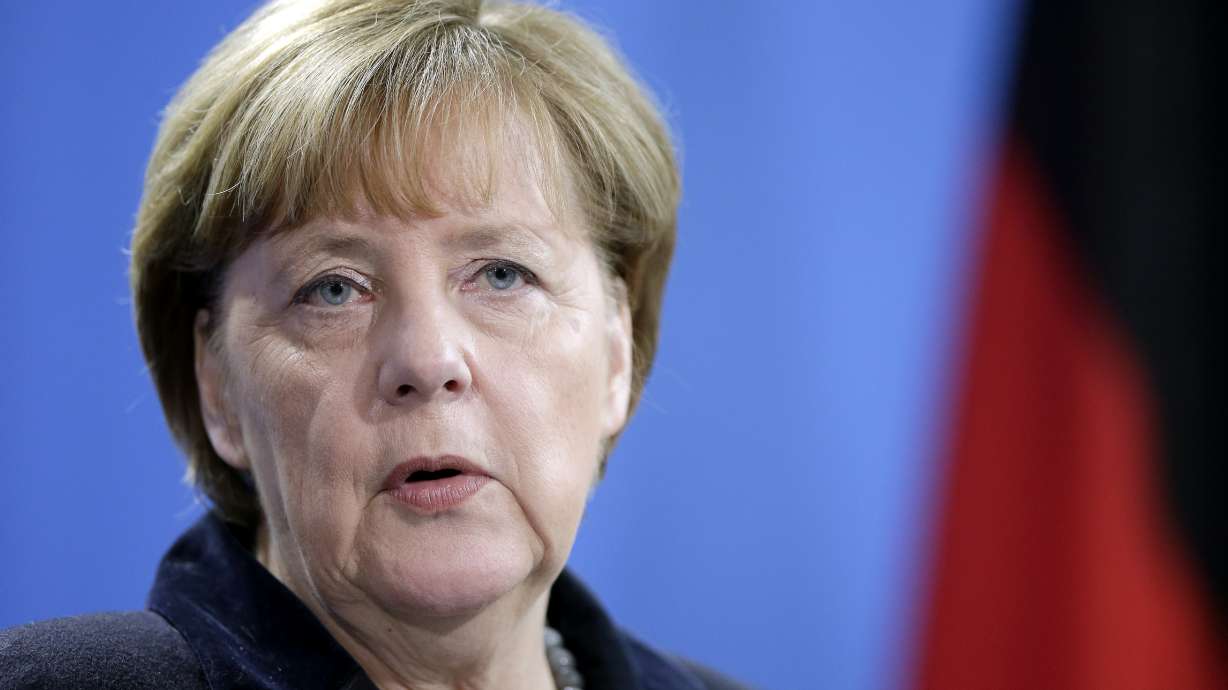 Protests in Cologne after assaults; Merkel pledges new laws