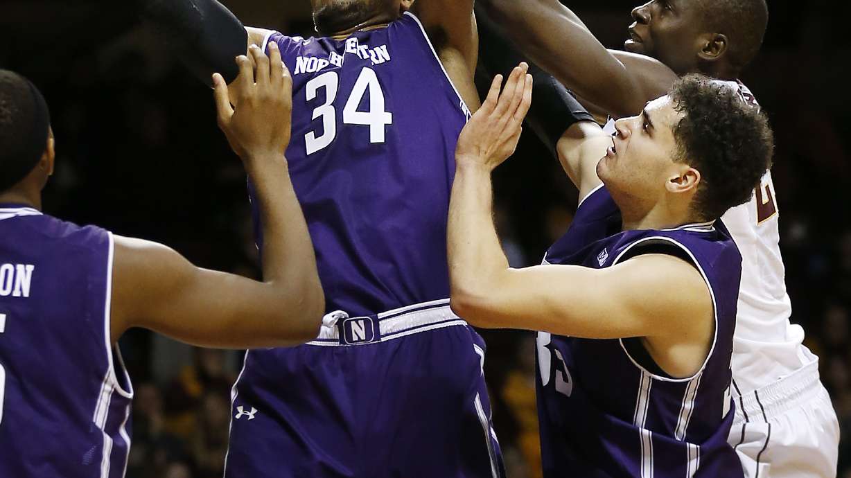 Falzon leads Northwestern over Minnesota 77-52