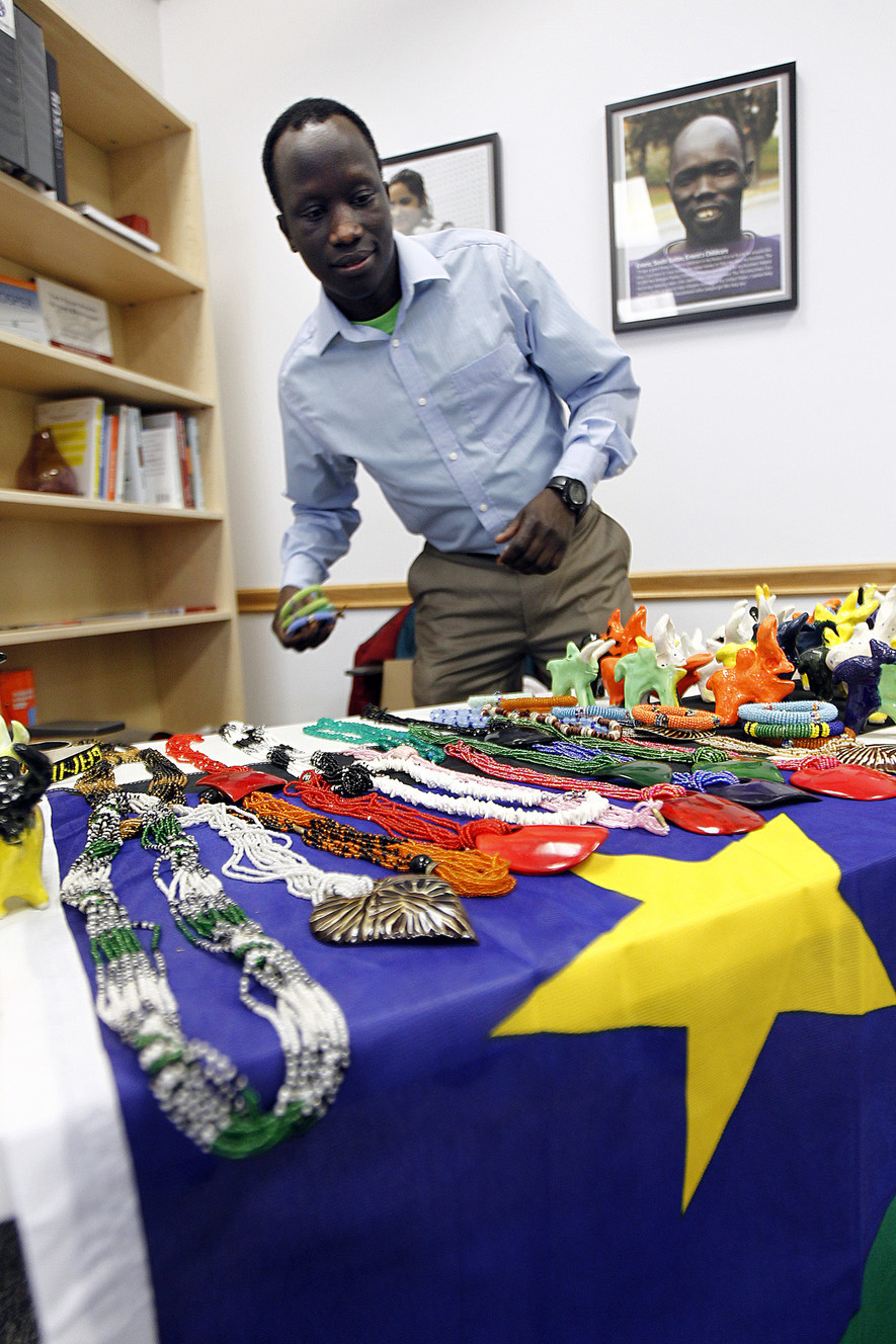 Dominic Raimondo sells clay sculptures and jewelry from his native South Sudan during a volunteer open house event at the Utah Refugee Education and Training Center in Salt Lake City, Saturday, Jan. 9, 2016. Raimondo uses the profits for a foundation in his home country building schools. (Photo: Chris Samuels, Deseret News)