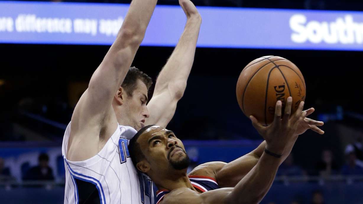 Wall helps Wizards beat Magic for 12th straight time, 105-99