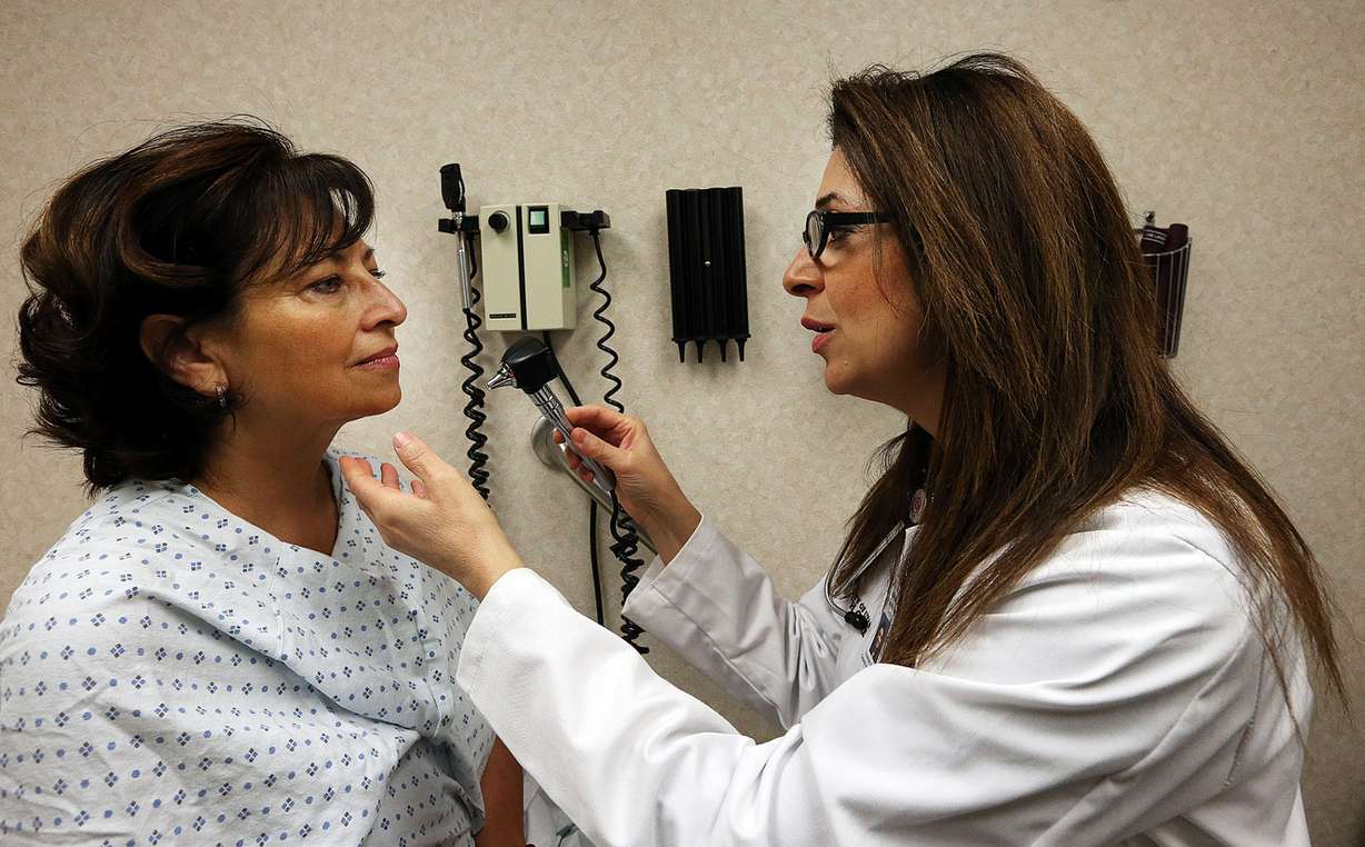 Dr. Hanadi Farrukh examines Jo Ann Stewart at the University of Utah Madsen Health Center in Salt Lake City, Monday, Dec. 21, 2015. (Photo: Ravell Call, Deseret News)
